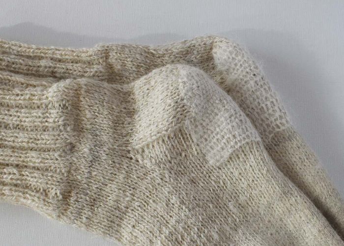Hand embroidery for mending: Socks mended with Scotch darning stitch